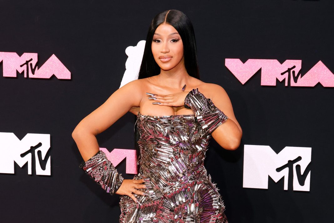 cardi-b’s-take-on-the-holiday-manicure-is-as-long,-pointy,-and-bold-as-you’d-expect-— see-the-photos